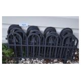Black Decorative Landscaping Fence and Bag of Deco