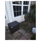Outdoor Storage Bin with Assorted Planters and Met