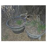 Two Plastic Half-Barrel Planters With Plants