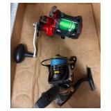 Two Fishing Reels, Berkley and Trophy 30