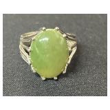 Sterling Silver Ring with Green Oval Cabochon Gems