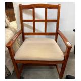 Wood-Framed Armchair with Cushioned Seat and Caste