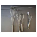 Four Stainless Steel Whisks by Winco