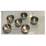 Six Stainless Steel Measuring Cups