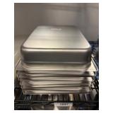 Stack of Stainless Steel Table Pans