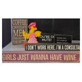 Shelf with Decorative Signs and Plush Display