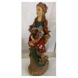 Polychrome Resin Figurine of Woman with Flowers