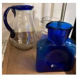 Cobalt Blue Glass and Clear Glass Pitchers