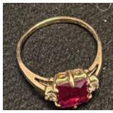 10K Gold Ring with Red Stone and Accent Details
