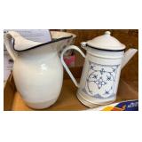 Two Enamel Pitchers with White & Blue Design