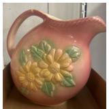 Pink Ceramic Pitcher with Floral Relief Design