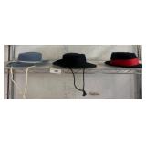 Three Cowboy-Style Hats with Hatbands