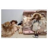 Seven Porcelain and Cloth Dolls