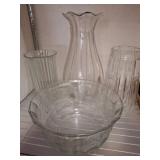 Four Glass Vases and a Bowl