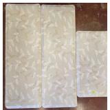 Three Beige Foam Stress Mats