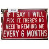 Red Metal Sign With Humorous Message