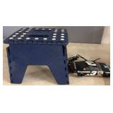 Blue Folding Stool and Goodwrench Toy Car