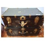 Two Vintage Black Steamer Trunks