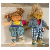 Cloth and Vinyl Dolls with Clothing