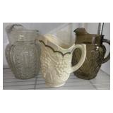 Three Decorative Pitchers