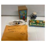 Toy Lot: Tin Train, Duck Toy, and Marbles