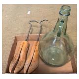 Glass Jug and Red Head Shoe Stretchers