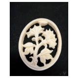 Oval Carved Bone Floral Pendant