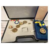 Military Medals and Insignia in Case