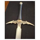 Fantasy Sword With Skull Motif and Black Grip