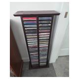 Dark Wood CD Storage Tower with Assorted CDs