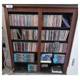 Wood Shelf Unit With CDs and Contact Lenses