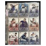 Binder of Baseball Cards on Showcase Rack