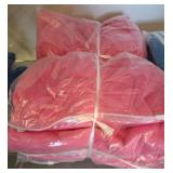 Pink Dog Apparel in Plastic Packaging