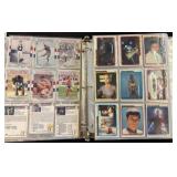 Binder of Sports and Popular Media Trading Cards