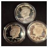 Three 1987 Kennedy Half Dollar Coins