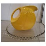 Fiesta Pitcher and Clear Glass Serving Plate