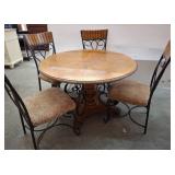 Round Dining Table and Four Metal Frame Chairs