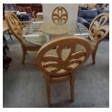 Glass Top Table with Four Carved Wood Chairs