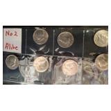 6 Kennedy Half Dollar Coins in Sleeves