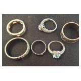 Seven Assorted Rings with Markings