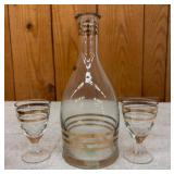 Glass Decanter with Gold Bands and Two Glasses