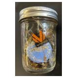 Glass Ball Jar with Assorted Pins and Brooches