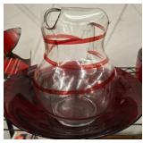 Clear Glass Pitcher with Red Swirl Design