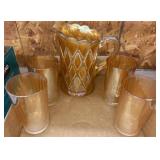 Amber Glass Pitcher and Four Matching Tumblers