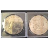 Two Eisenhower One Dollar Coins in Cases