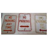 Three Metal No Parking Signs