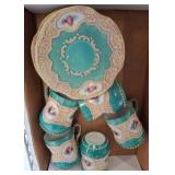 Porcelain Teacups and Saucers with Floral Design