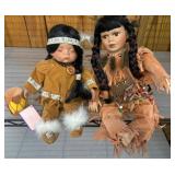 Two Porcelain Dolls in Native-Inspired Attire