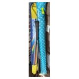 Golf Clubs and Polyester Beach Umbrellas