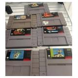 7 Super Nintendo Game Cartridges
